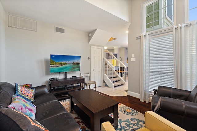 living room with a healthy amount of sunlight and light wood-type flooring