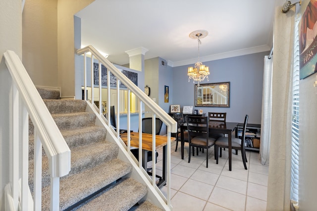 stairs featuring tile patterned floors, a wealth of natural light, crown molding, and a chandelier