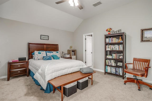 carpeted bedroom with ceiling fan and lofted ceiling