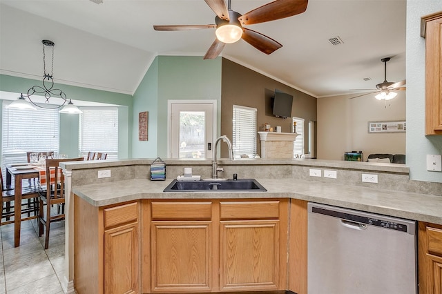 kitchen featuring stainless steel dishwasher, vaulted ceiling, ceiling fan, sink, and light tile patterned floors