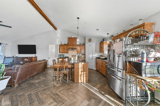 kitchen featuring a kitchen breakfast bar, dark parquet floors, hanging light fixtures, vaulted ceiling with beams, and stainless steel fridge with ice dispenser