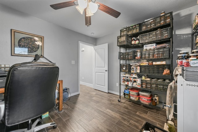 office with hardwood / wood-style flooring and ceiling fan