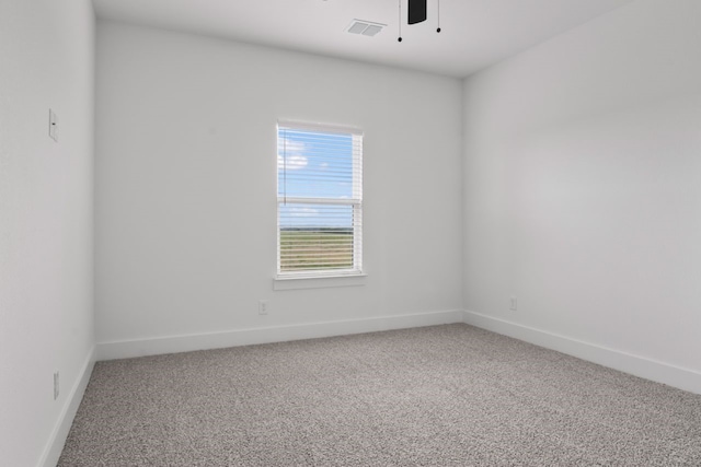 unfurnished room featuring carpet flooring and ceiling fan