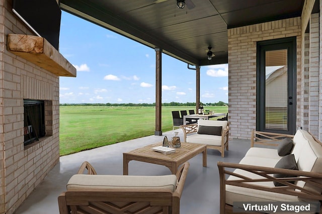 view of patio / terrace with outdoor lounge area and ceiling fan