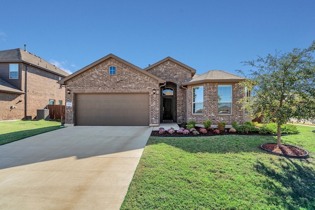 view of front facade featuring central AC, a front lawn, and a garage