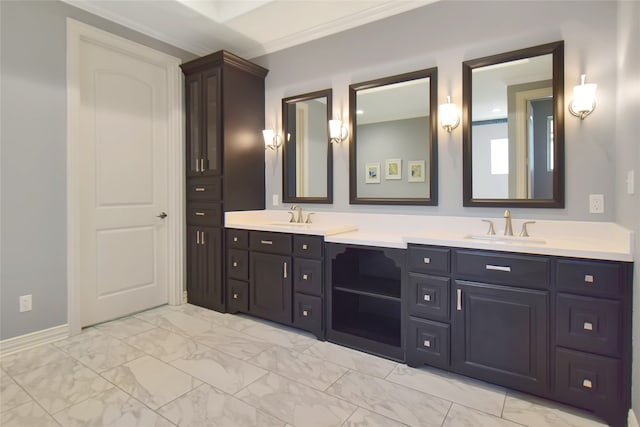 bathroom featuring vanity and crown molding