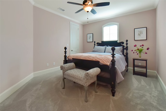 bedroom with ceiling fan, crown molding, and light carpet