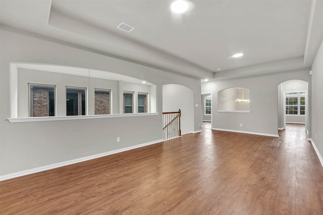 spare room with wood-type flooring