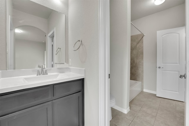 full bathroom with tile patterned floors, vanity, toilet, and shower / bathing tub combination