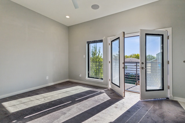 interior space with french doors and dark carpet