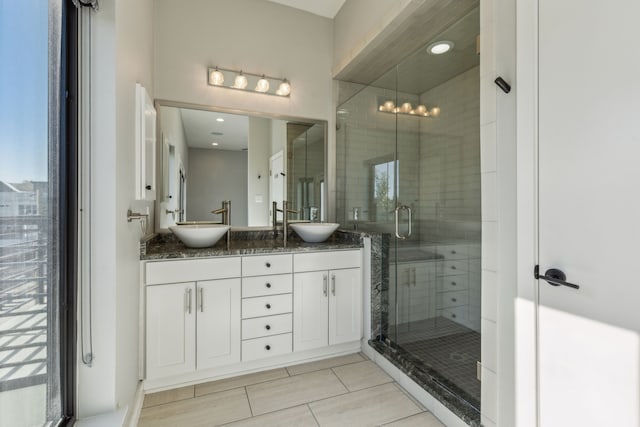 bathroom with vanity and walk in shower