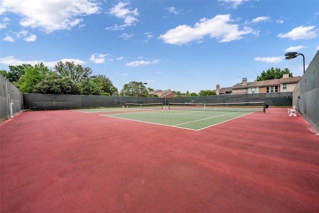 view of tennis court with basketball court