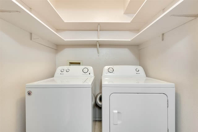 washroom with separate washer and dryer