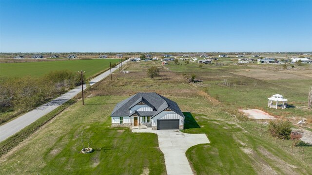 drone / aerial view with a rural view