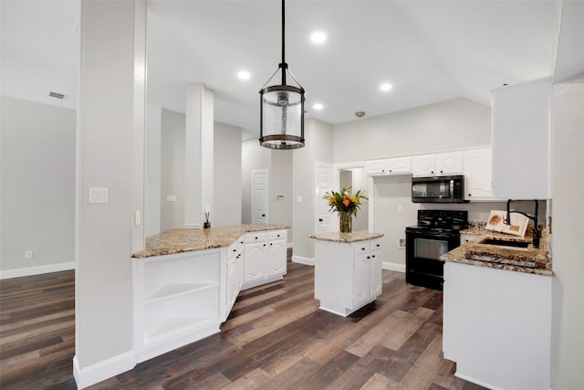 kitchen featuring a center island, dark stone counters, hanging light fixtures, black electric range, and white cabinetry