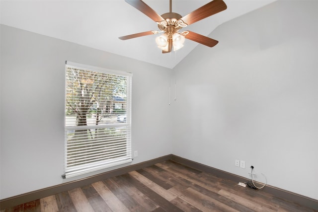 unfurnished room with ceiling fan, dark hardwood / wood-style floors, and lofted ceiling