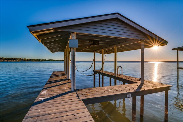 dock area with a water view