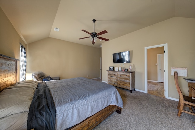 carpeted bedroom featuring ceiling fan and vaulted ceiling