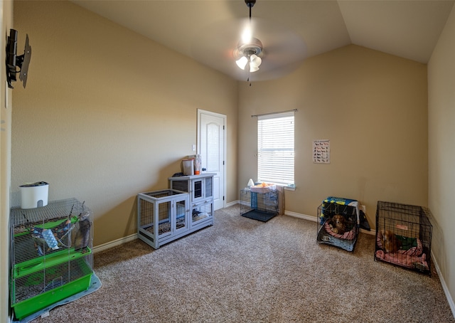 playroom featuring carpet flooring, ceiling fan, and vaulted ceiling