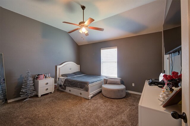 carpeted bedroom featuring ceiling fan and vaulted ceiling