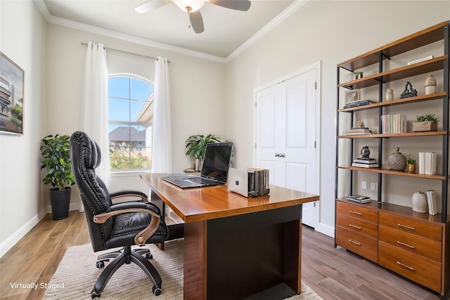 office with crown molding and ceiling fan