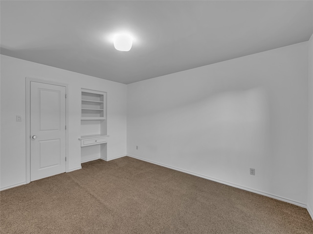 unfurnished bedroom with a closet and carpet