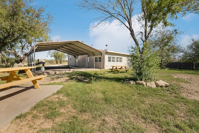 view of yard featuring a carport