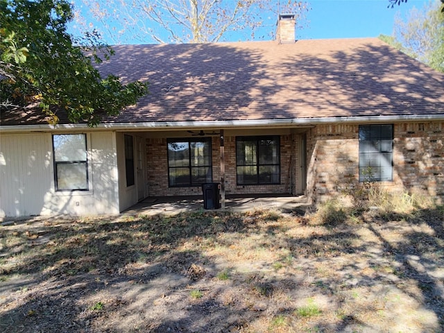 back of house featuring a patio