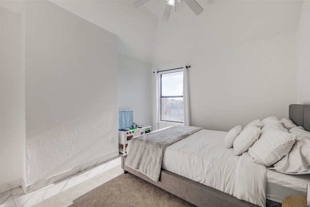 bedroom with vaulted ceiling and ceiling fan