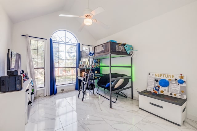 interior space with ceiling fan and lofted ceiling