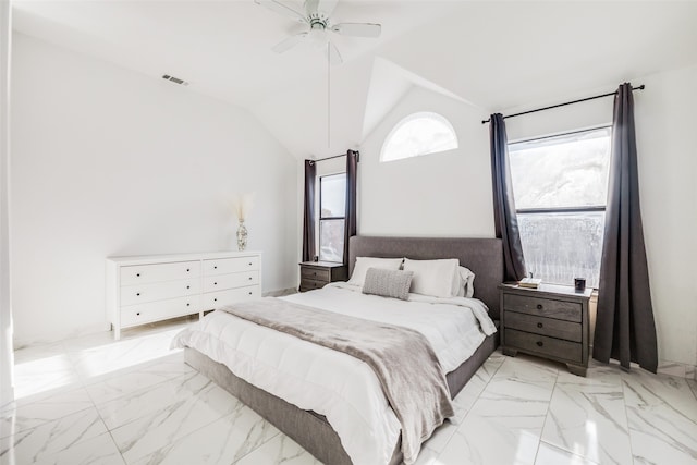 bedroom with ceiling fan and vaulted ceiling