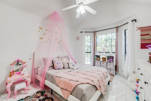 bedroom featuring ceiling fan and vaulted ceiling