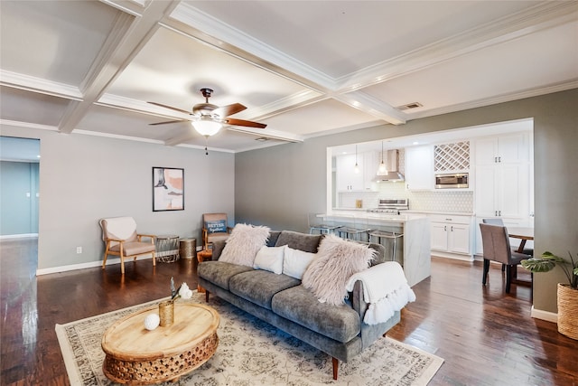 living room featuring beam ceiling, ceiling fan, coffered ceiling, and dark hardwood / wood-style floors