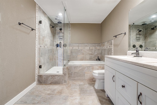 full bathroom with vanity, separate shower and tub, and toilet