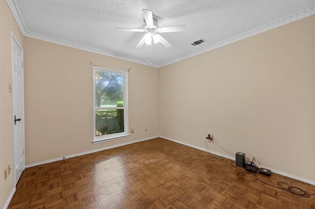 spare room with ceiling fan, crown molding, a textured ceiling, and dark parquet flooring