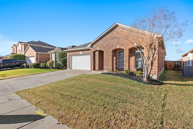 view of front of property featuring central AC, a front yard, and a garage