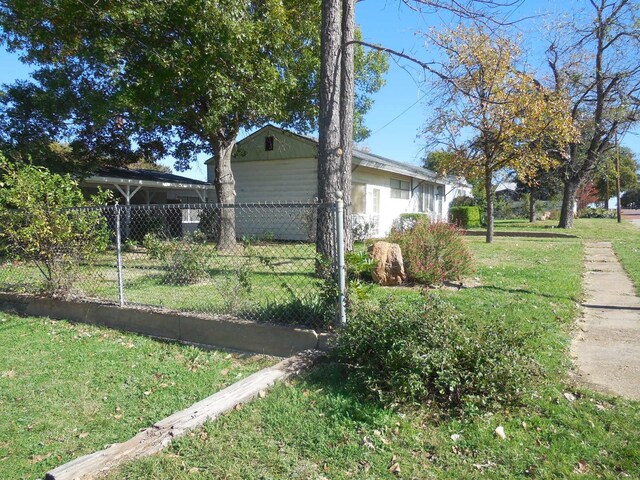 view of home's exterior featuring a yard