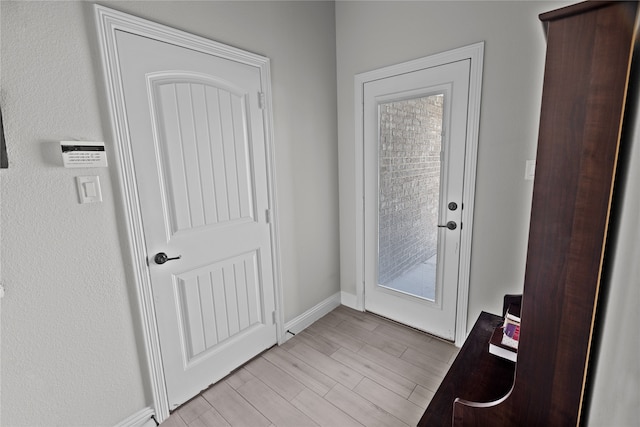 entryway with light wood-type flooring