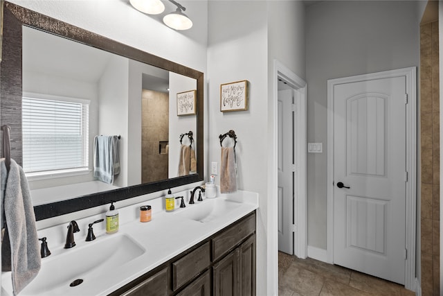 bathroom featuring tile patterned floors and vanity