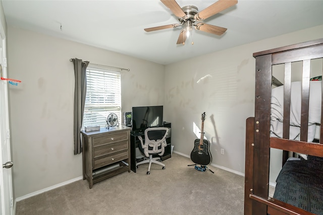 carpeted office with ceiling fan