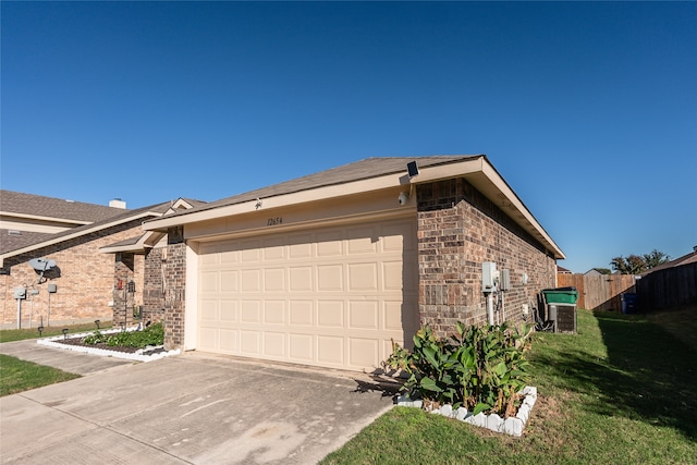 view of side of home with a garage