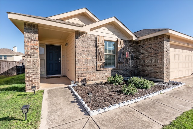 view of front of home with a garage