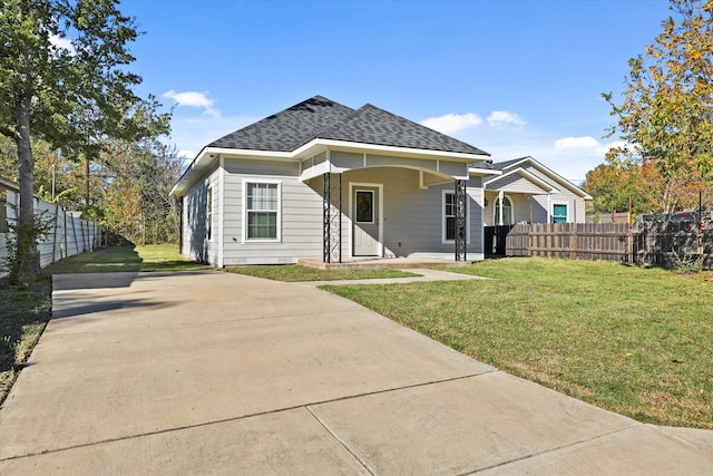 view of front of house featuring a front yard and a porch