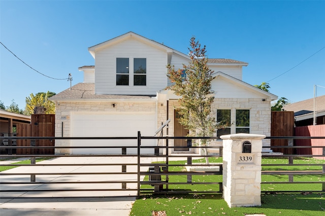 view of front of property featuring a garage