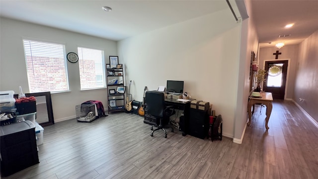 office with hardwood / wood-style flooring