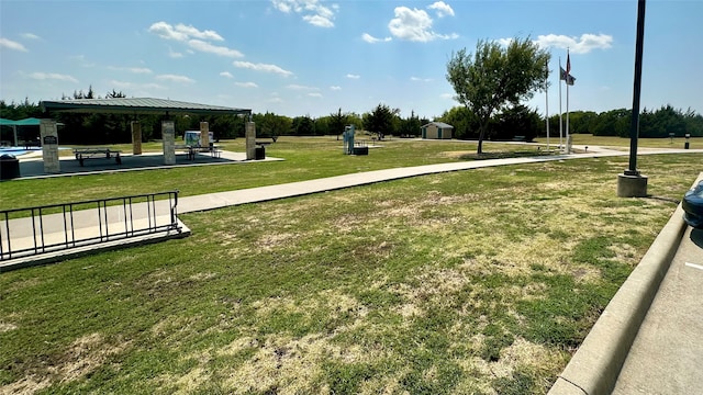 view of home's community featuring a lawn and a gazebo