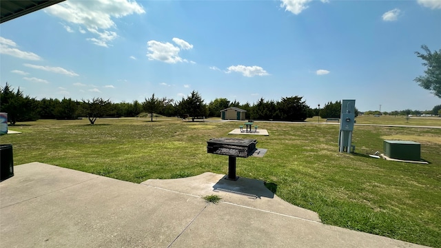 view of home's community with a lawn