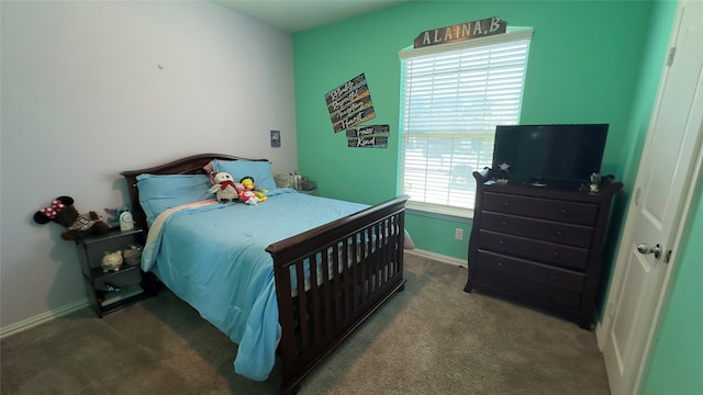 bedroom featuring carpet