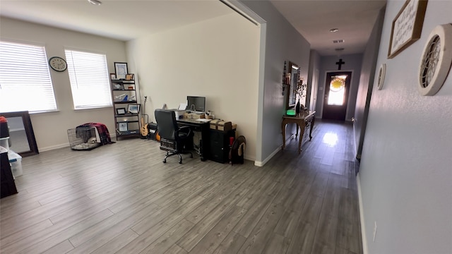 office with hardwood / wood-style flooring