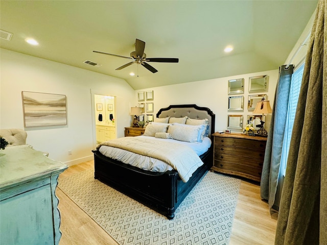 bedroom with light wood-type flooring, ceiling fan, and lofted ceiling